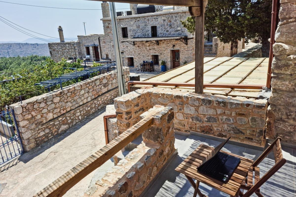 Traditional guesthouse courtyard in the medieval village of Avgonima, Chios